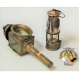 An early 20th century brass and chrome miners safety lamp, The Protector Lamp & Lighting Co Ltd,