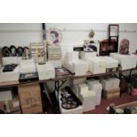 An extensive collection of Elvis Presley memorabilia, to include collectors plates, wall clock,