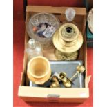 A box of miscellaneous items to include brass pedestal oil lamp, Edinburgh hand cut crystal glass