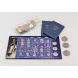 A small collection of miscellaneous coinage to include Man in Flight commemorative coins,