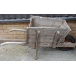 A rustic planked pine twin handled cart