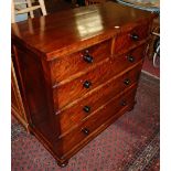 A mid-Victorian flame mahogany square front chest of two short over three long drawers, with ovolo