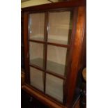 A 19th century mahogany single door glazed display cabinet, with glass interior shelves, w.80cm