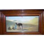 A pair of faux walnut framed prints of Middle Eastern scenes, each 28 x 58cm