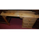 A modern pine round cornered single pedestal desk, width 109cm