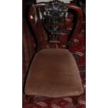 A late Victorian mahogany framed salon suite comprising; two-seater sofa, pair of armchairs, and