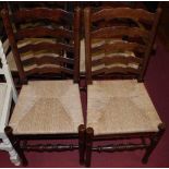 A set of ten Lancashire style oak ladderback rush seat dining chairs (8+2)Condition report: All