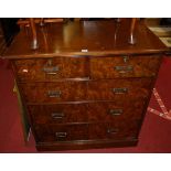 A late Victorian walnut and figured walnut squarefront chest of two short over three long