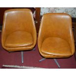 A set of four 1960s tan vinyl upholstered swivel chairs raised on chrome basesCondition report: