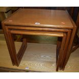 A 1970s G-Plan teak nest of three occasional tables, the largest width 53.5cm