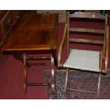 An early 20th century walnut folding campaign table; together with a beech framed folding campaign