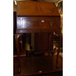 A 1930s walnut and figured walnut lady's slopefront single drawer writing bureau, w.65cm