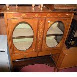 An Edwardian mahogany floral satinwood inlaid and further crossbanded double door glazed display