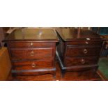 A pair of Stag Minstrel two-drawer bedside chests, each having upper slides, width 52.5cm