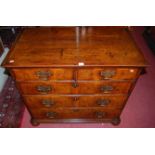An 18th century oak figured walnut and crossbanded chest of two short over three long graduated