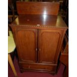 An early 20th century mahogany double door side cupboard, having single lower drawer, w.77cm