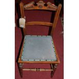 An early 20th century oak beech and tapestry inset elbow chair, together with an Edwardian walnut