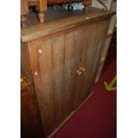 A rustic planked pine double door side cupboard, with interior shelves, w.106cm