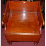 A Victorian mahogany hinged panelled seat commode chair on turned supports, width 57cm