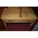 A Victorian pine round cornered single drawer side table, w.90cm