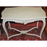 A late 19th century provincial French painted centre table, of shaped form on cabriole supports (cut