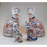 A pair of large modern Chinese figures of seated cats, decorated in the Imari palette, h.36cm;