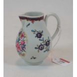 An 18th century Worcester porcelain sparrowbeak cream jug being polychrome decorated,