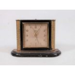 An early 20th century Oris travel alarm clock, having 15-jewel eight day movement, h.8cmCondition