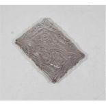 An Edwardian silver visiting card case, of shaped rectangular form, having foliate engraved