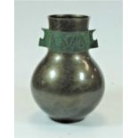 A Japanese Showa period bronze metal vase of bulbous form, the frieze having a band incised with
