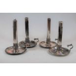 A set of four late 19th century silver plated chamber sticks, each with engraved armorial to the