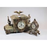 A late 19th century French green onyx and gilt metal mounted mantel clock having enamel dial with