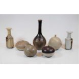 A collection of Studio stoneware specimen vases, some with incised artist initials
