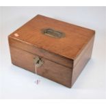 A 1920s oak deed box, having recessed brass handle, the hinged lid opening to reveal a zinc-lined