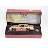 A boxed Nascar Country 50th Anniversary diecast vehicle