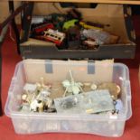 Three boxes of loose kit-built and other toy vehicles, to include military tanks