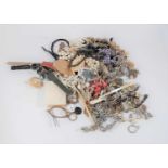 A box of miscellaneous costume jewellery, to include paste set earrings, lady's compact, various