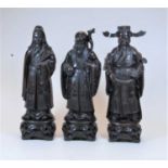 A set of three modern resin figures of the gods Fu, Lu and Shou, the 3 gods of happiness,