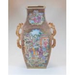 A large 19th century Chinese Canton floor vase of rectangular baluster form, each panel typically