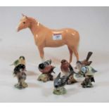 A Beswick palomino horse, gloss finish, height 20cm, together with a collection of seven various