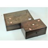 A Victorian rosewood and mother of pearl inlaid work box, the hinged lid opening to reveal a part-