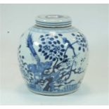 A Chinese stoneware blue & white ginger jar and cover of barrel form, the body typically decorated