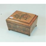 A Victorian simulated satinwood work box of sarcophagus form, transfer printed with various roses,