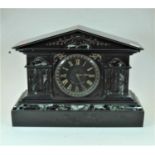 A large late 19th century black slate and veined marble cased mantel clock of architectural form,