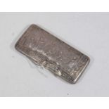 An early 20th century continental white metal visiting card case, having spring-loaded hinged lid,