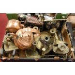 A box of miscellaneous metal ware to include turned brass candlesticks, brass trivet, copper