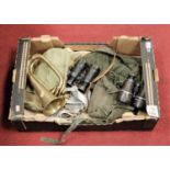 A box of miscellaneous items, to include brass bugle, WWI private purchase binoculars, canvas