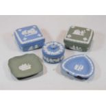 A collection of Wedgwood green and blue jasper wares, to include three trinket boxes and two pin