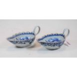 A pair of Chinese export blue and white sauceboats (handles restored), w.22cm