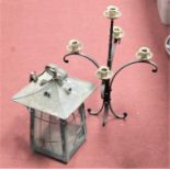 An early 20th century hall light fitting; together with a wrought iron four sconce candelabra; and a